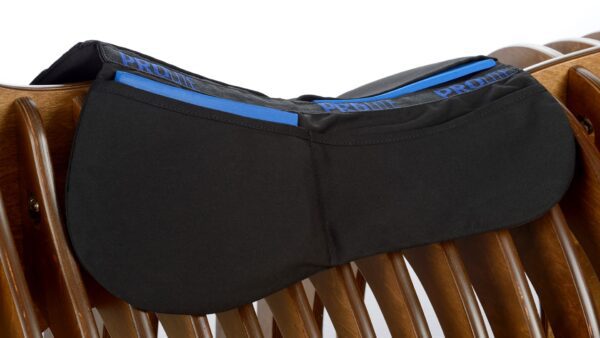 A black and blue ProLite Multi-Riser Thin Pad on a wooden bench.