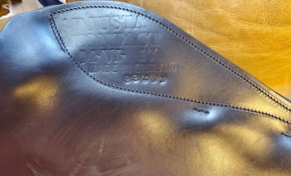 A close up of an Albion Kontact Lite Demo - ON TRIAL saddle with a name on it.