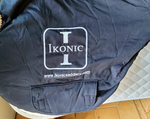 A blue bag with the word Ikonic Jump "Evolution" - Calf Lined on it.
