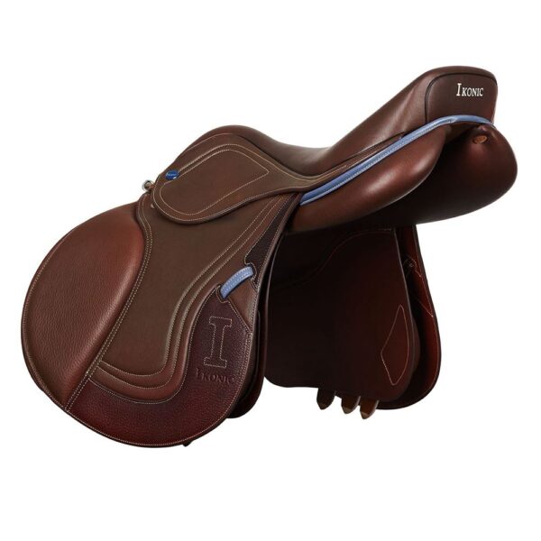 A brown Ikonic Jump "Evolution" - Calf Lined saddle on a white background.