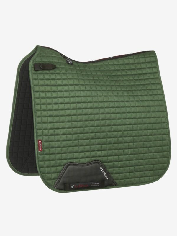 A green equestrian saddle pad on a white background.