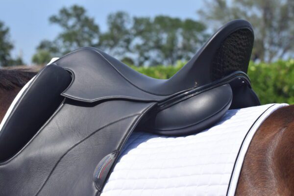 A close up of a Tota Freedom PRO 2 Dressage Saddle.