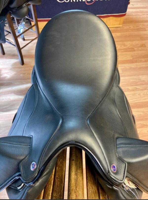 The back of a Tota Freedom PRO 1 Dressage Saddle in a store.