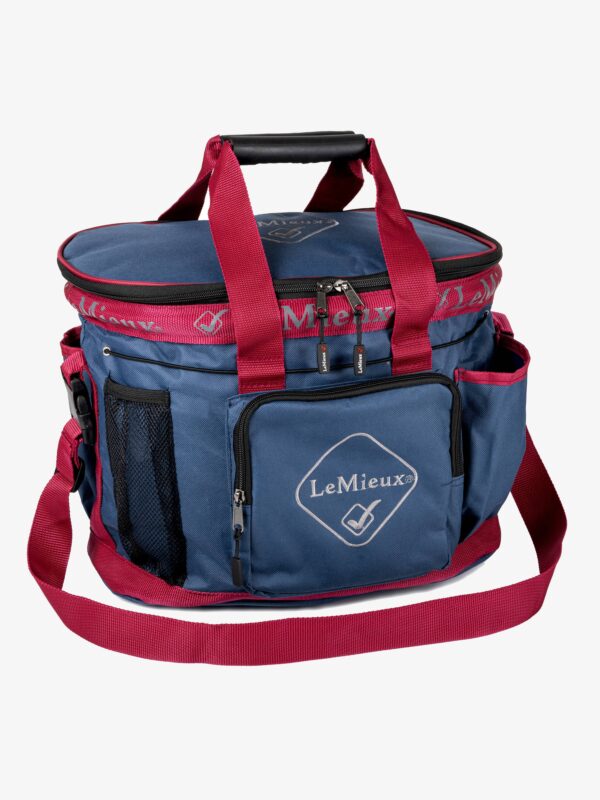 A blue and red Grooming Bag - LeMieux with a logo on it.