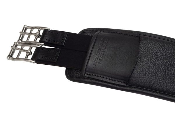 A black leather Kent & Masters Long Girth with two metal buckles.