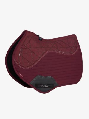 Maroon quilted saddle pad with geometric design.