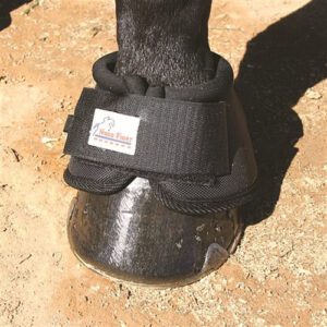 Horse hoof with protective boot on.