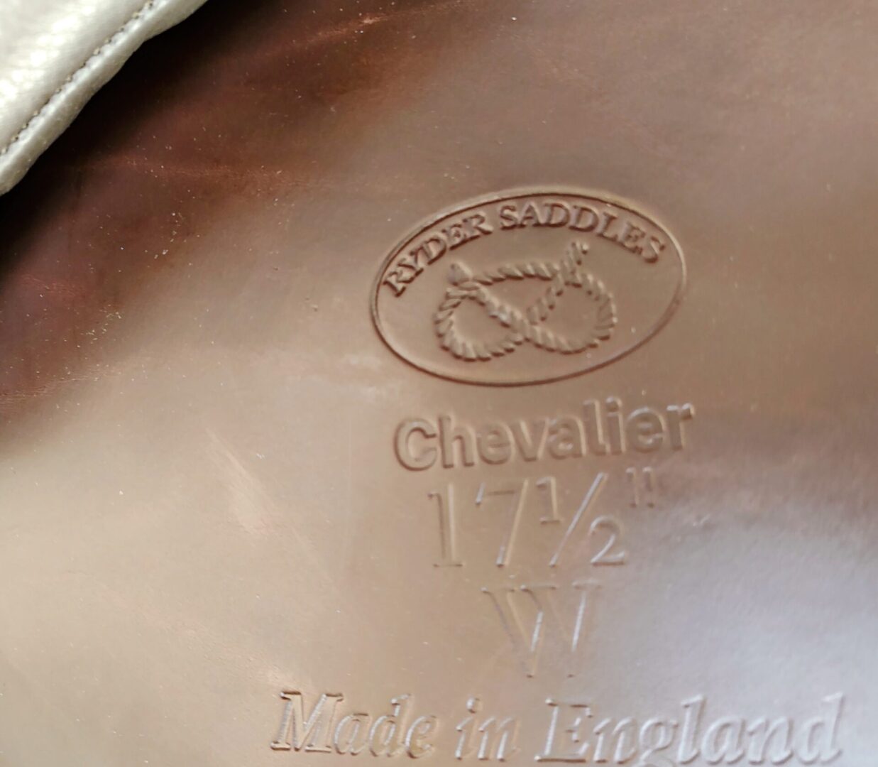 Embossed Ryder saddle details, made in England.