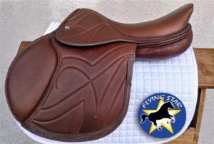 Brown leather English saddle with Flying Star logo