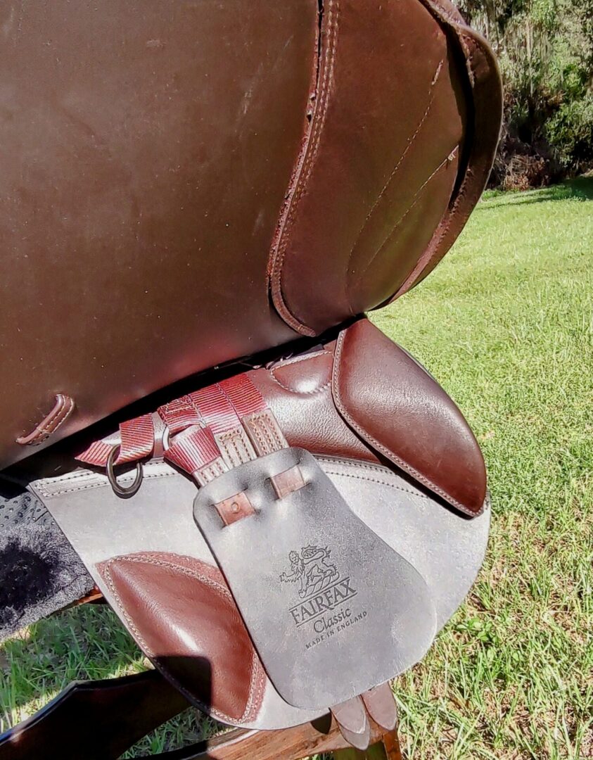 Brown saddle with distinctive underflap design.
