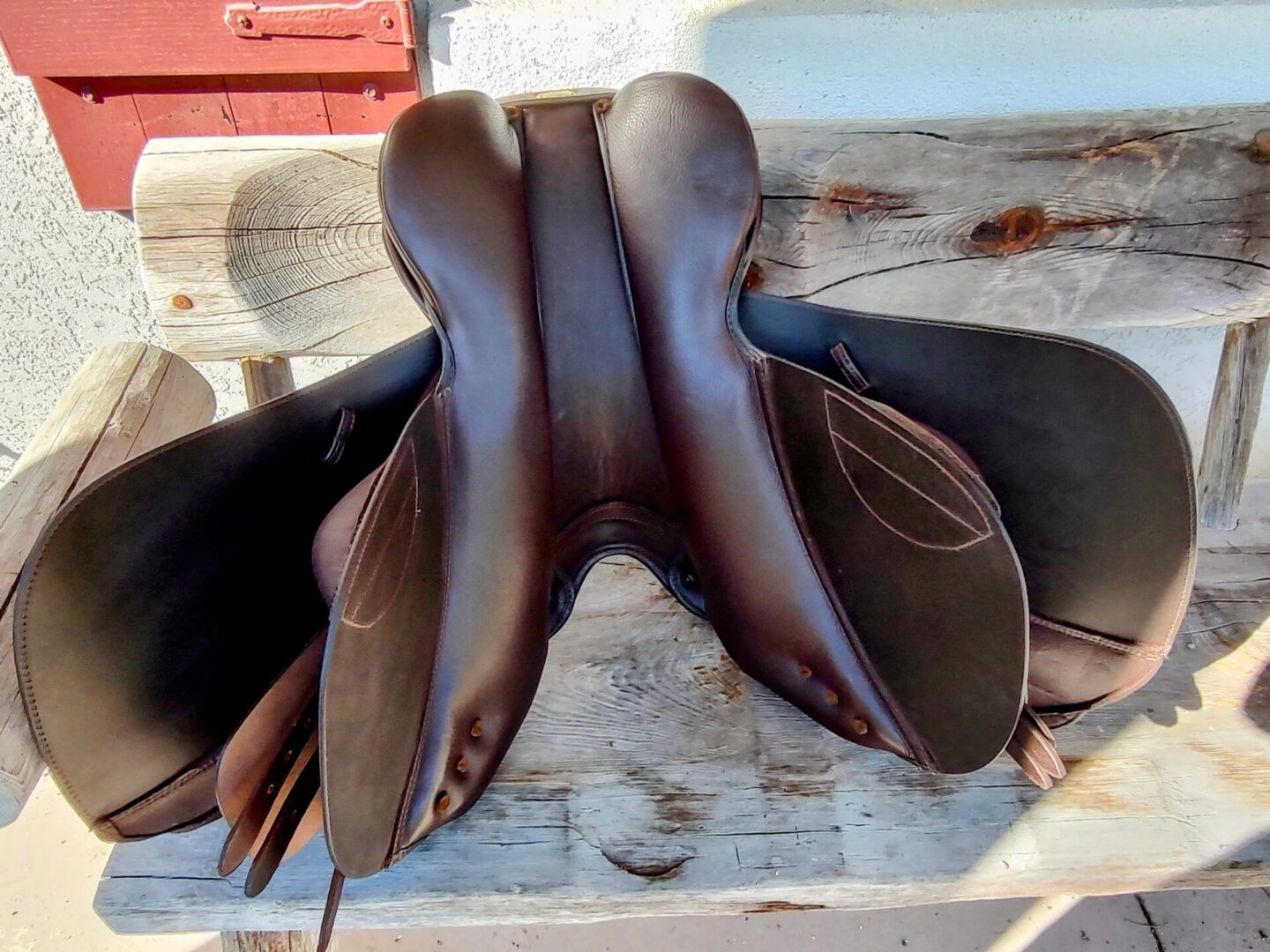 Detailed view of saddle's underside and panels.